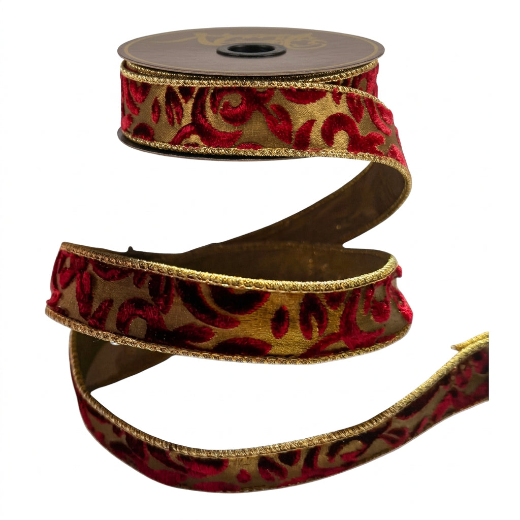 Roll of antique-gold designer ribbon featuring a raised deep-red velvet scroll and leaf pattern with coordinating metallic-gold finished edges.
