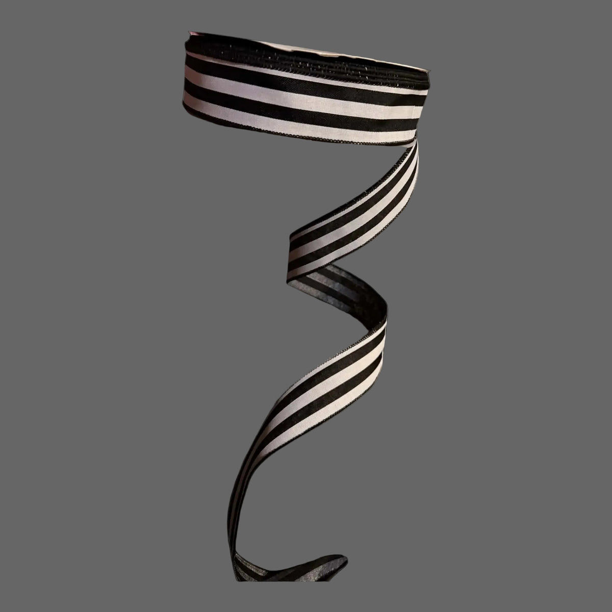 1.5-inch x 100-foot black-and-white horizontally striped designer ribbon featuring a sheer organza-like texture and coordinating stitched edges.
