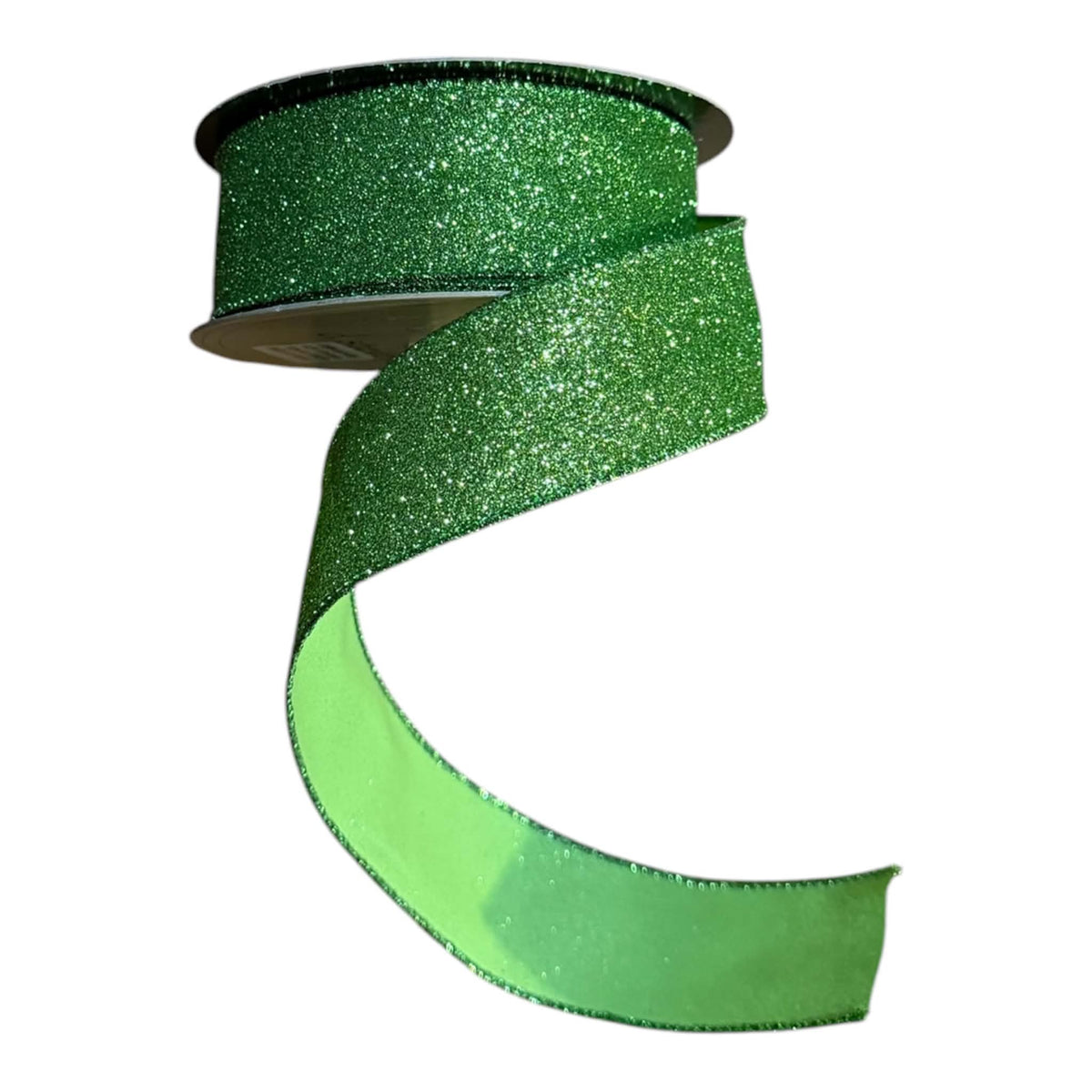 D. Stevens 1.5-inch x 10-yard emerald green glitter designer ribbon on a spool, featuring a densely sparkling emerald face with green braided edges and a smooth spring-green satin reverse visible on the loose tail