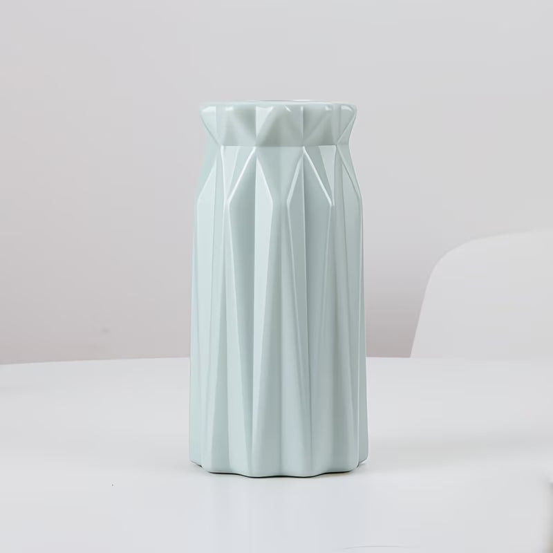 7inx3.5in Lt Blue Plastic Vase Container