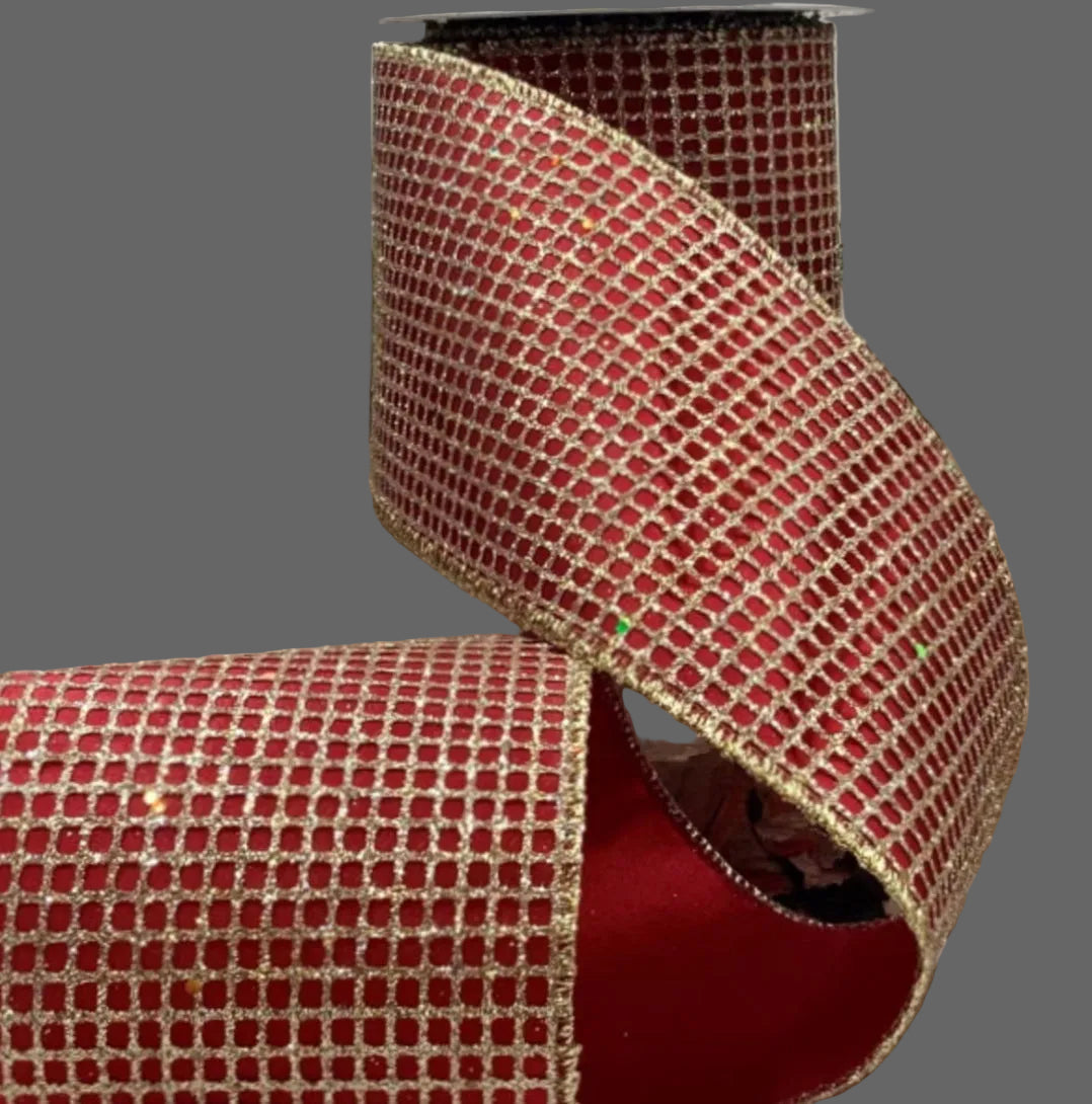 4-inch x 10-yard red and gold designer Christmas ribbon roll featuring a rich red background, shimmering metallic gold lattice grid pattern, and coordinating gold-toned decorative edges.