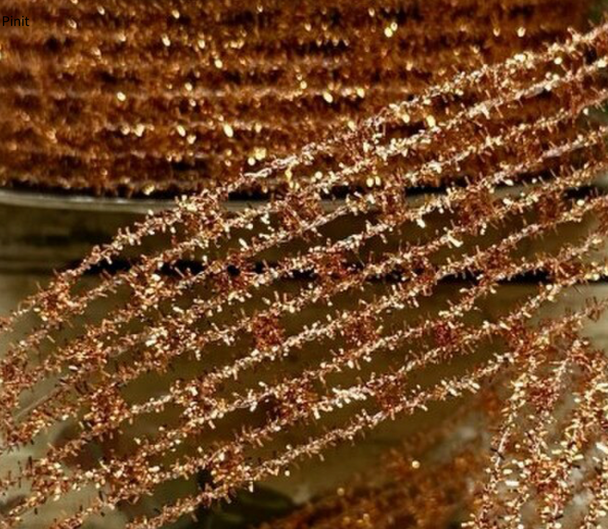 Metallic copper diamond stretch tinsel designer ribbon, 1.5 inches wide by 10 yards long, with sparkling copper mesh texture for fall and Christmas wreath making.