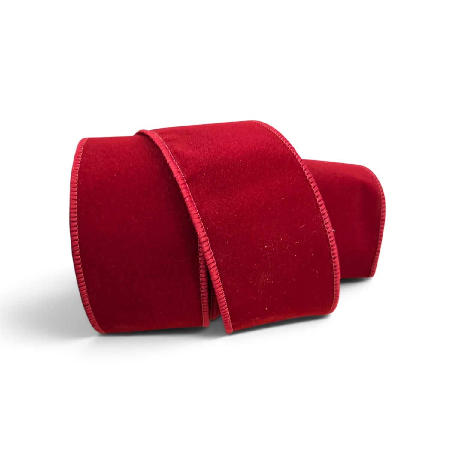 2.5 inch red velvet satin back wired edge ribbon for wreath making, Christmas bows, floral arrangements, tree decorating, gift wrapping, and luxury holiday décor, crimson