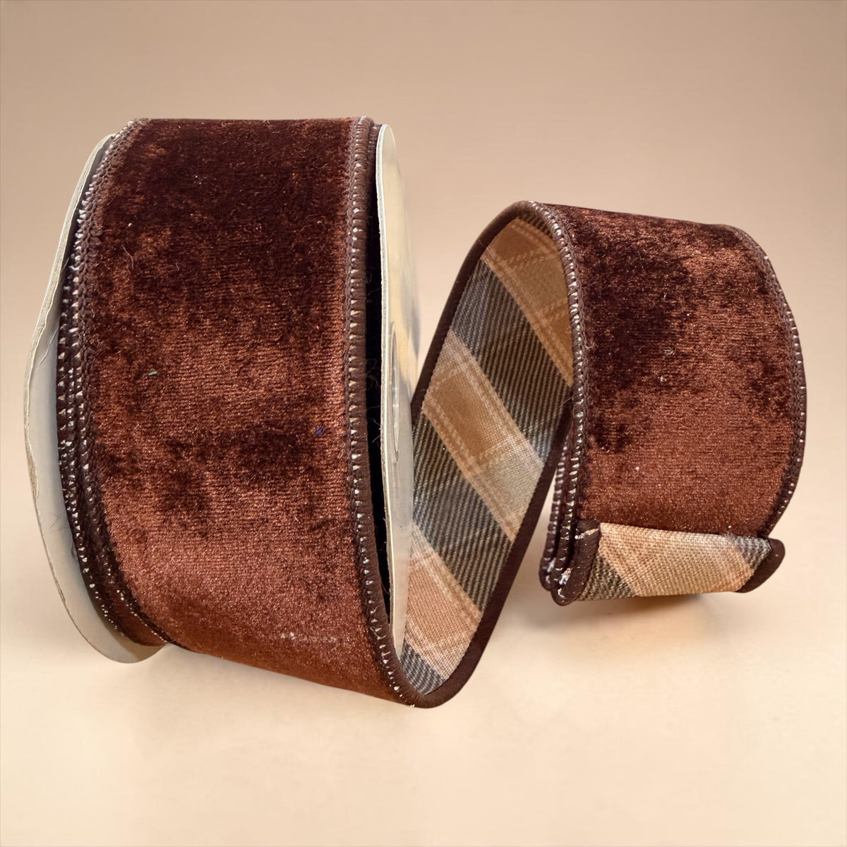 Deluxe chocolate brown velvet double fused designer ribbon roll with coordinating tan and charcoal plaid backing and decorative stitched edges.
