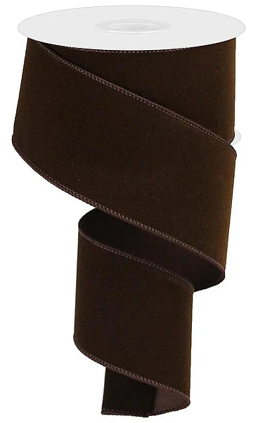 Chocolate brown indoor velvet ribbon, 2.5 inches wide by 10 yards long, displayed on a white spool with soft velvet texture and decorative stitched edges.