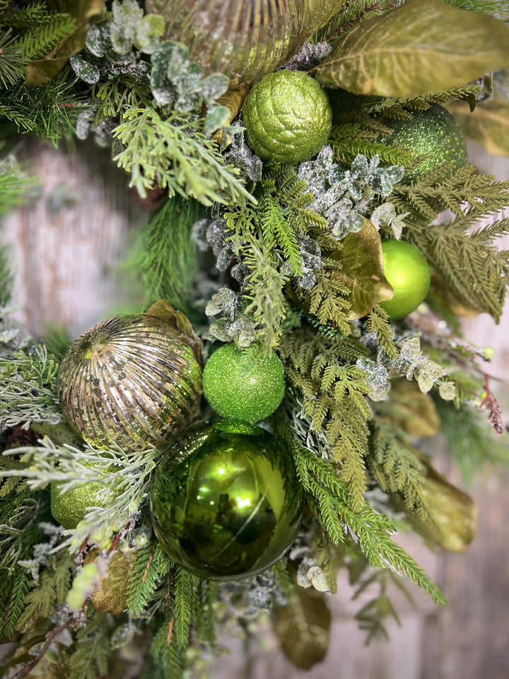 Christmas Grapevine wreath with Pine, Green and Gold Ornaments with sparkling foliage for the holidays