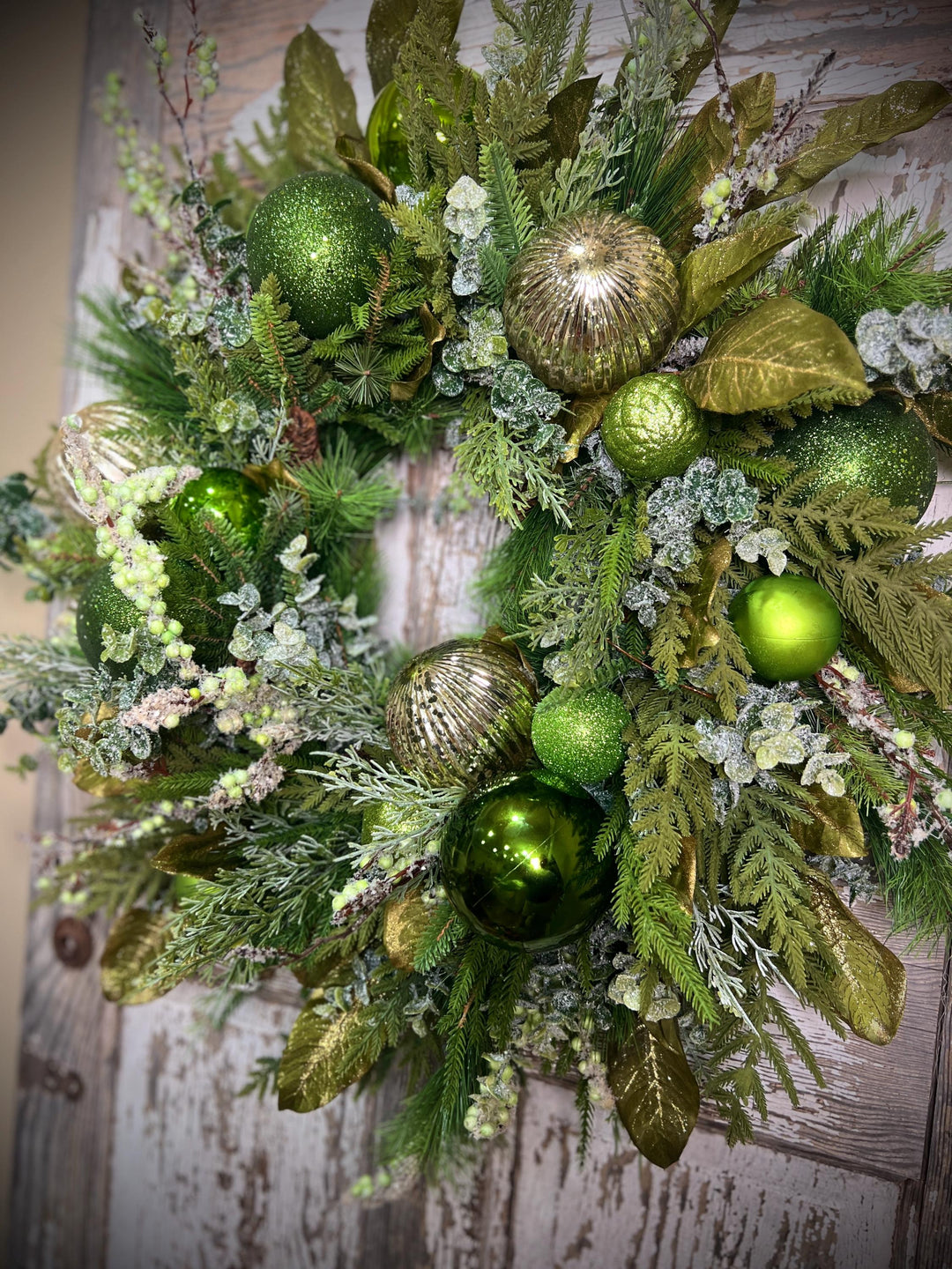 Christmas Grapevine wreath with Pine, Green and Gold Ornaments with sparkling foliage for the holidays