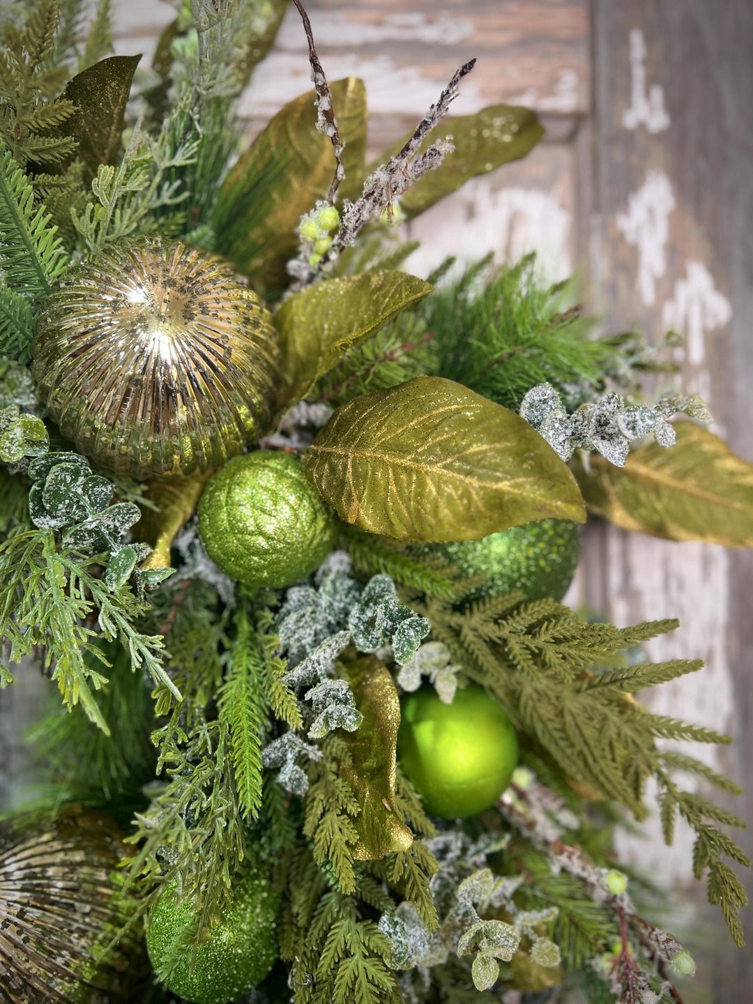 Christmas Grapevine wreath with Pine, Green and Gold Ornaments with sparkling foliage for the holidays