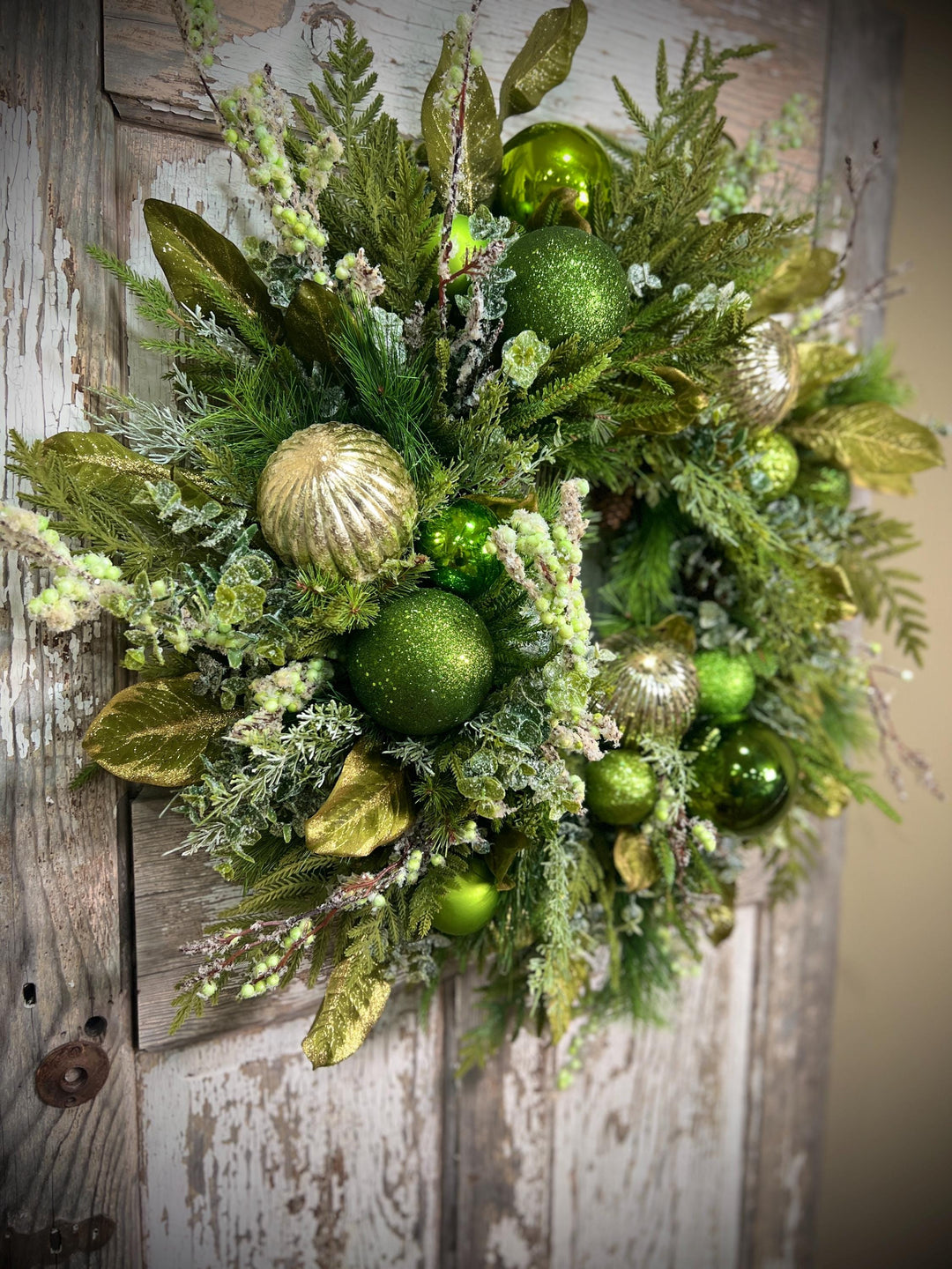 Christmas Grapevine wreath with Pine, Green and Gold Ornaments with sparkling foliage for the holidays