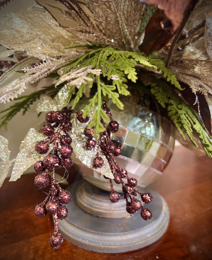Unique Oranament arrangement with designer magnolias stacked on a wooden disc - Designer netting ribbon