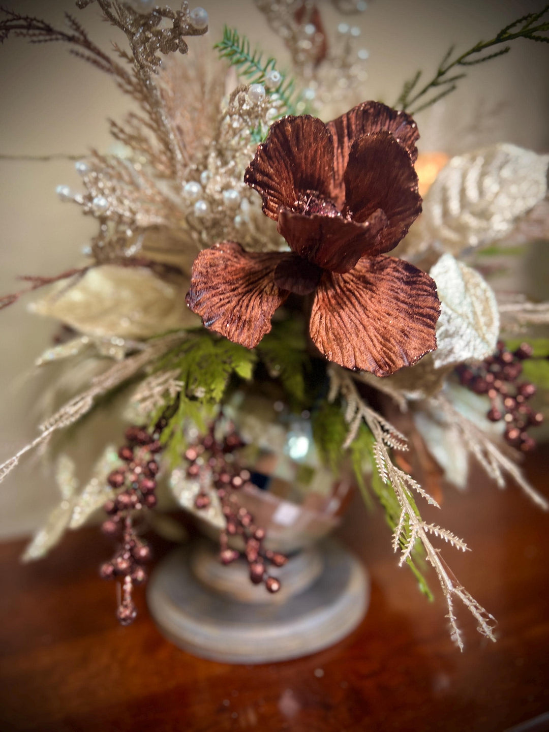 Unique Oranament arrangement with designer magnolias stacked on a wooden disc - Designer netting ribbon