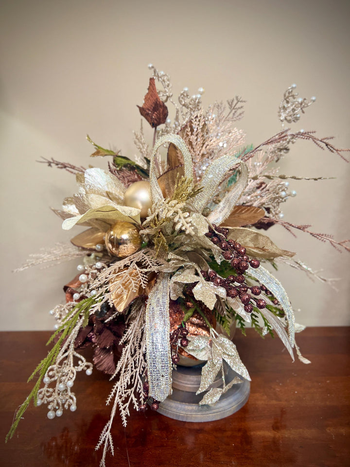 Unique Oranament arrangement with designer magnolias stacked on a wooden disc - Designer netting ribbon