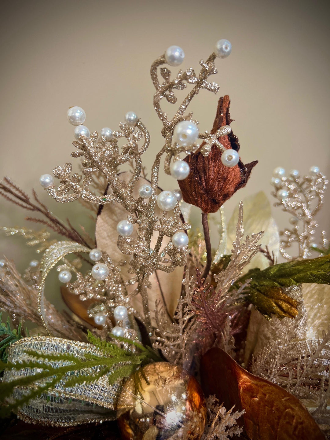 Unique Oranament arrangement with designer magnolias stacked on a wooden disc - Designer netting ribbon