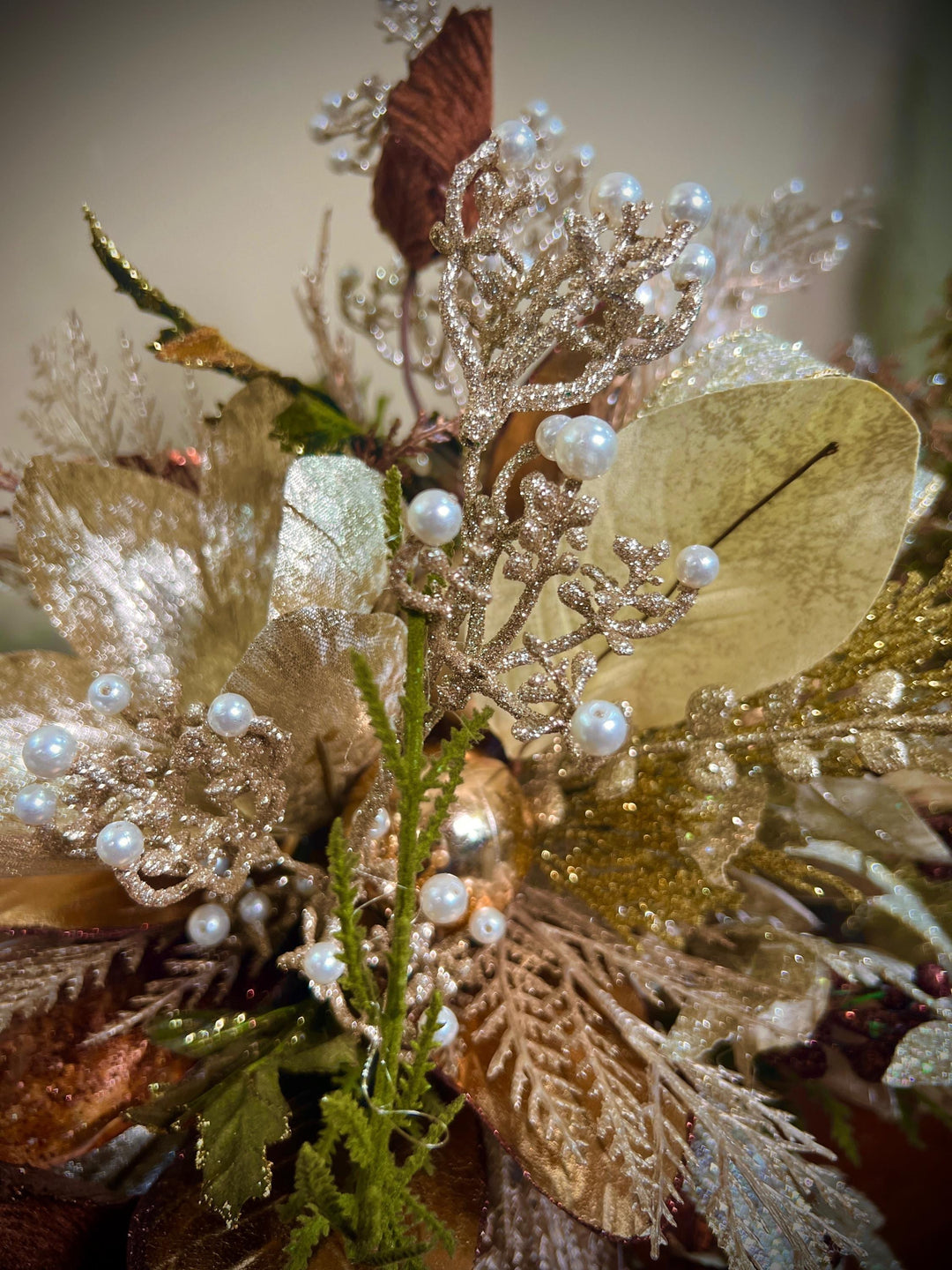 Unique Oranament arrangement with designer magnolias stacked on a wooden disc - Designer netting ribbon