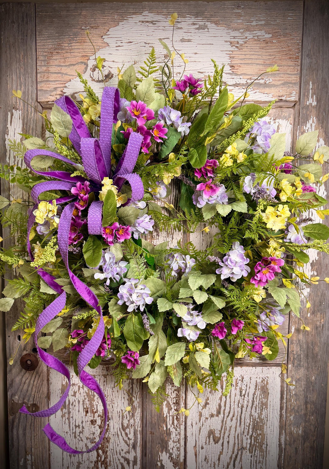 Spring Garden Wreath with Lavender, Yellow, Magenta Florals – Grapevine Base Designer Bow