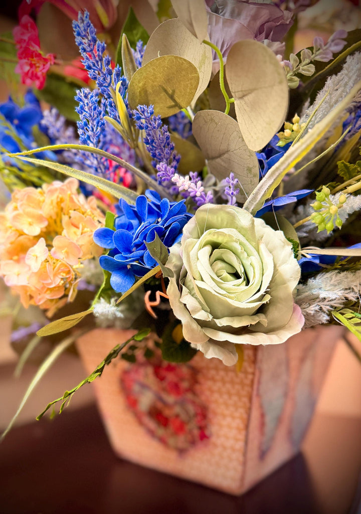 Spring Handcrafted Vintage container arrangement with hydrangeas and much more!