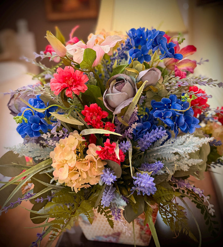 Spring Handcrafted Vintage container arrangement with hydrangeas and much more!