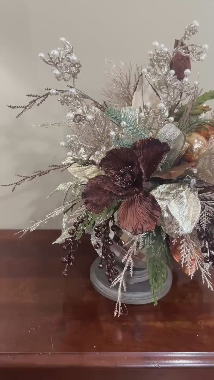 Unique Oranament arrangement with designer magnolias stacked on a wooden disc - Designer netting ribbon